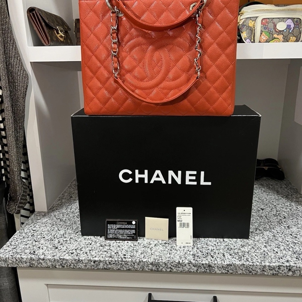 100% Authentic Chanel Caviar Quilted Grand Shopping Tote Bright Orange Leather